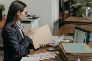 electrician reviewing electrical certification documents on desk
